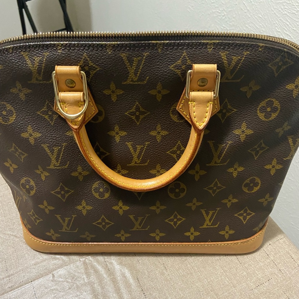 Authentic Louis Vuitton Alma Bag with dust bag